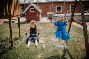 kids playing on charlotte playsets from Woodplay of the Carolinas